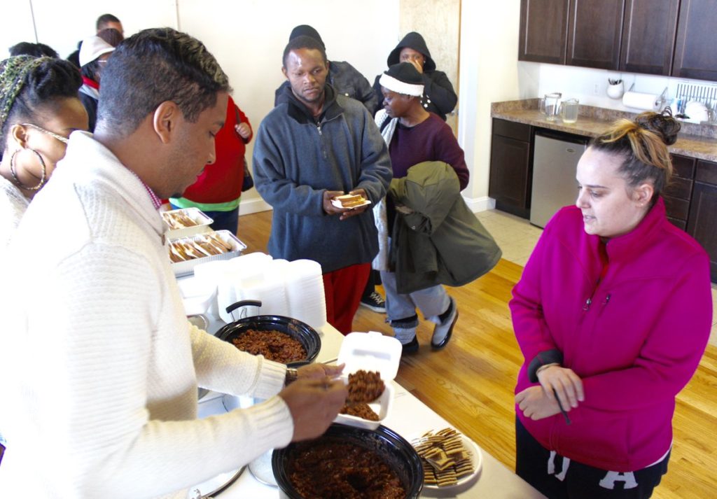 Courtney Jordan feeds and clothes the homeless at an event hosted by the Courtney Jordan Foundation